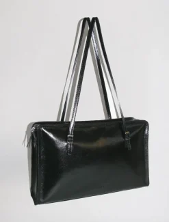 Outlet No 1002/Caye Kvinder Cayetano